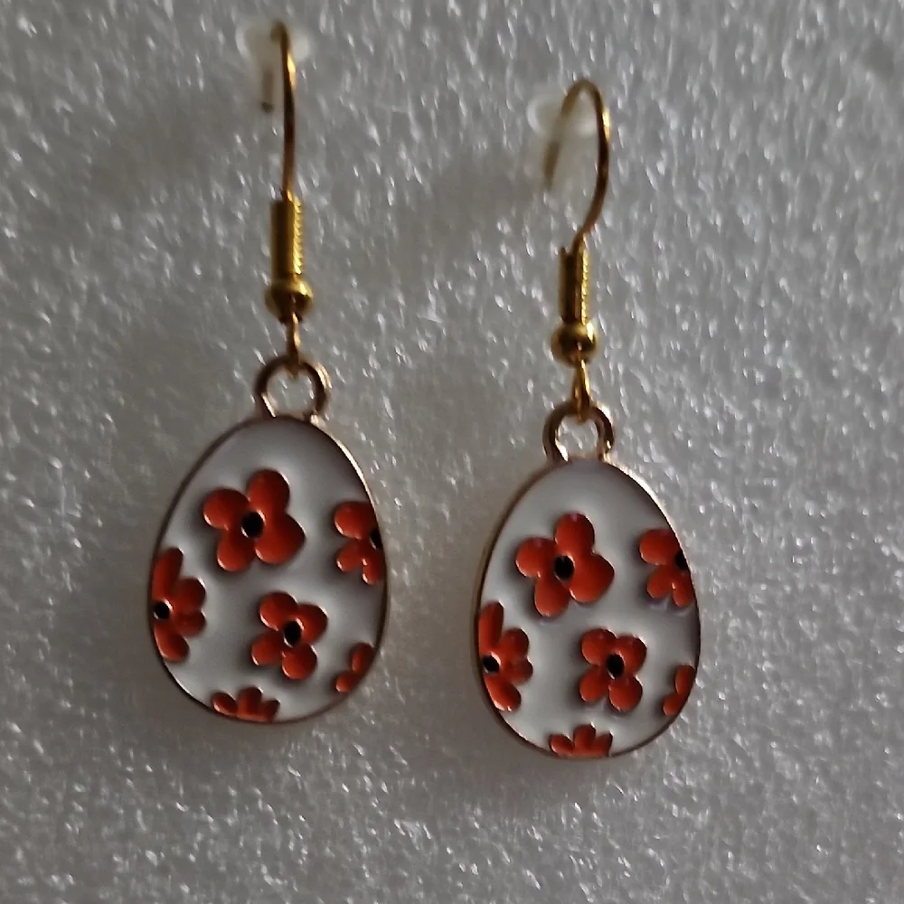 Hand Crafted White Enamel Drop Earrings with Orange Floral Motif